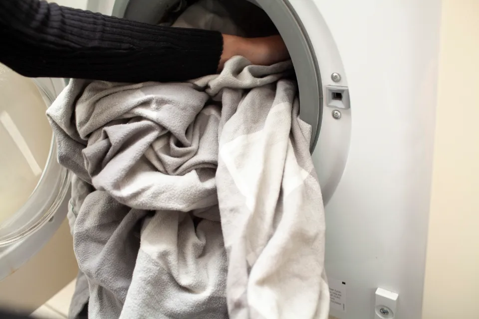 Can You Wash Sheets With Clothes? Must Read!